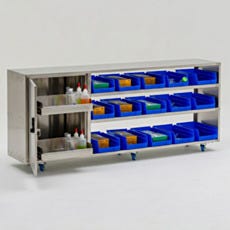 Under counter multifunctional storage cabinet fully loaded with bin organizers and cleaning supplies on swivel casters