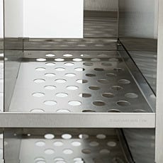 close-up of cubbie inside stainless steel storage cabinet