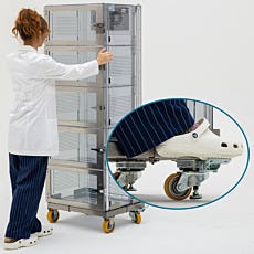 Foot levers at the rear of the mobile base stop and lock the base in place