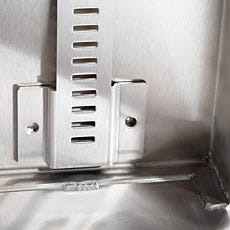 Close-up of reinforced shelving bracket and welded joint inside stainless steel storage cabinet, ensuring durability and sterility for cleanroom use.