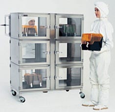 Dual-sided 6-chamber desiccator in use storing electronics