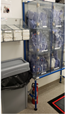 PVC plastic wall mounted cabinet with framing filled with lab garments