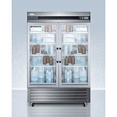 upright refrigerator with closed glass panel doors containing bottles and boxes inside