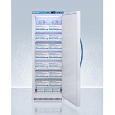 upright refrigerator open with boxes inside