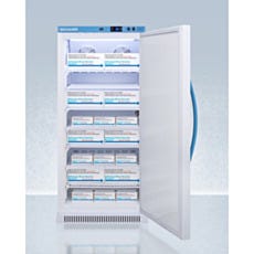 view of open upright refrigerator with boxes inside