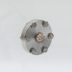 Thermocouple feedthrough panel for transferring signals through vacuum chamber walls