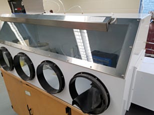 Polypropylene glovebox isolator for 2 users in an engineering lab