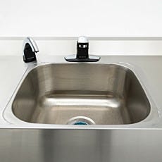 Touchless cleanroom sink with motion-activated soap and faucet