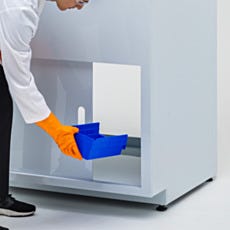 Model sliding storage door open and puting away totes