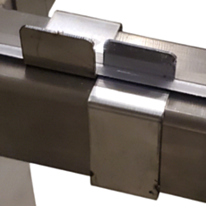 stainless steel mounting brackets attached to vibration isolated stand
