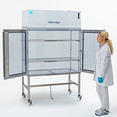 Vertical laminar flow hood with both clear doors open revealing three shelves and work interior