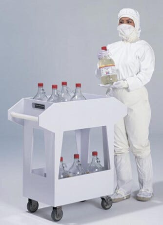 polypropylene chemical transport cart with 12 compartments, filled with one-gallon bottles of chemicals