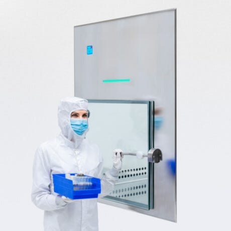 Smart BioSafe CleanMount pass-through with frameless glass door mounted in cleanroom wall