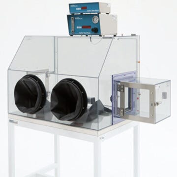 Gas-purged plastic glove box isolator with automatic nitrogen gas control modules