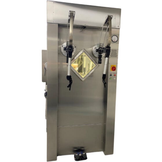 nuclear hot cell with telemanipulator arms, leaded glass, lead-lined interior, and access doors