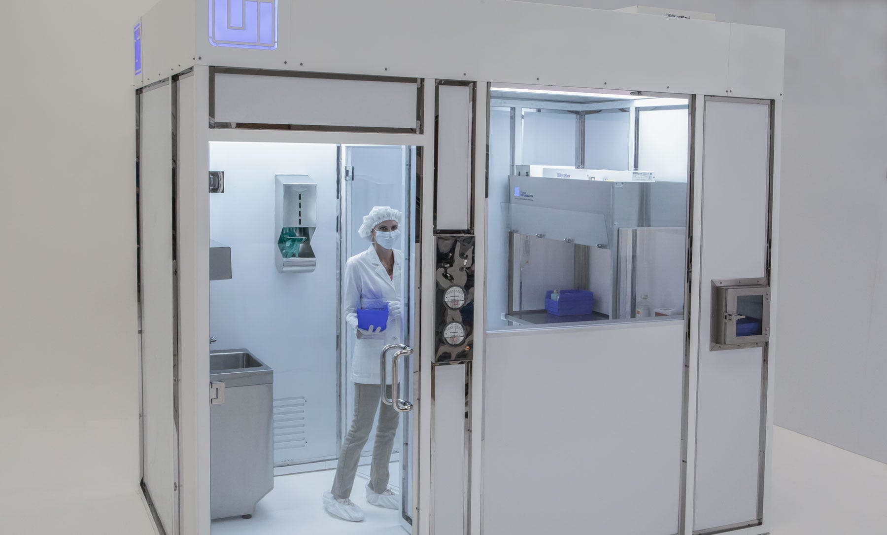 USP-compliant compounding cleanroom, with an ISO 8 anteroom leading into the ISO 7 compounding room
