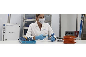 How does an Ionizing Blow-Off Gun improve product quality?