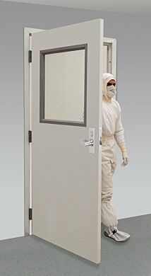 UL-listed fire-rated door with wired-glass window, shown with optional mortise locking mechanism and hinges installed