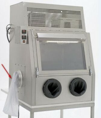 Waste bags, shown on the left side of this glovebox.  |  1694-44 displayed