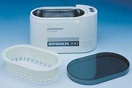 The Mini-Ultrasonic Cleaner comes ready to operate with a plastic cover and a parts basket  |  2622-00 displayed