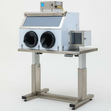 Custom-made single-user polypropylene glovebox with mounted FFU and optional airlock on an adjustable table and detachable bottom  |  1693-87 displayed