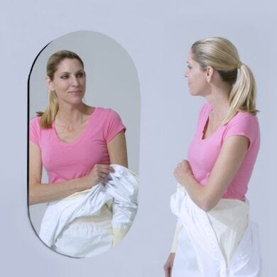 Frameless wall-mounted oval cleanroom mirror  |  5254-00 displayed