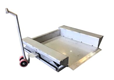 Superlift stainless steel semi portable ground level lift in lowered position showing ground-level loading platform, raised edges, tow handle, and red swivel wh  |  1735-15 displayed