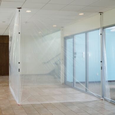 Spring-loaded ZipWall poles with clear plastic sheeting create effective dust containment barriers to protect clean areas and sensitive equipment | 6603-98 displayed