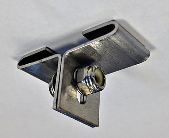 Allows suspension of a curtain from standard T-grid ceiling without the need for ceiling disassembly.  |  6704-23A displayed