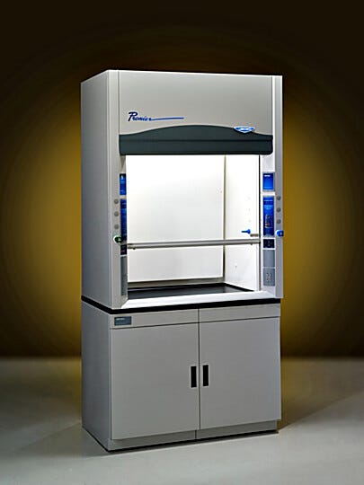 Four foot Protector Premier laboratory fume hoods by Labconco shown with optional storage cabinets  |  3649-00 displayed