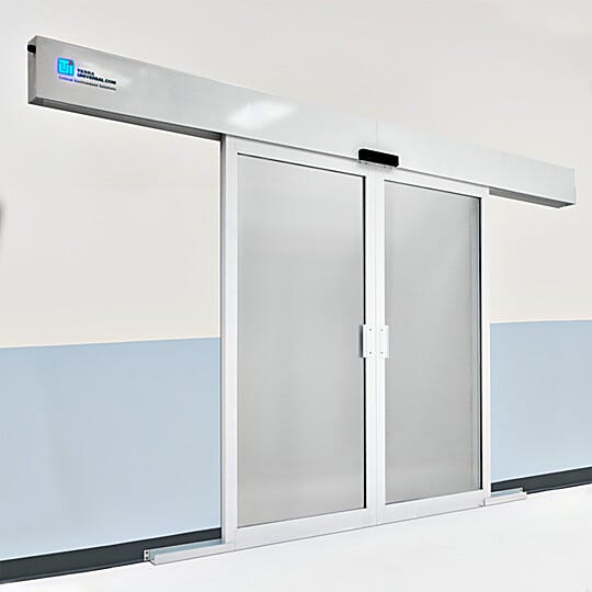 The Powder-Coated Aluminum Automatic Double Bi-Parting Sliding Door will auto reverse when something obstructs the path of the door  |  6709-17 displayed