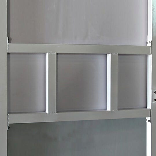 Powder coated steel frame for cleanroom pass throughs is automatically built into the frame of the cleanroom