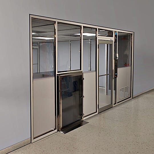 Custom cleanroom wall partition with 2" square stainless steel frame, passthrough chamber and door; panels top half static-dissipative PVC, bottom half  |  6600-11 displayed