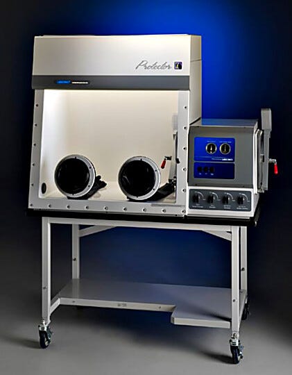 Protector Controlled Atmosphere Glove Box shown with fiberglass lining and optional base stand | 3644-05 displayed