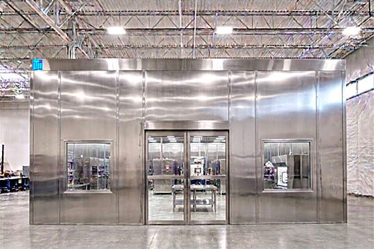 Custom Hybrid Universal® High Bay Cleanroom featuring stainless steel configurations for sensitive large-format manufacturing applications | 6604-42 displayed