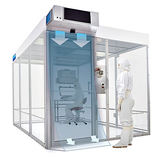 High-velocity cleanroom air curtain installed above the entryway of a hardwall Terra Universal Cleanroom | 6601-50A displayed