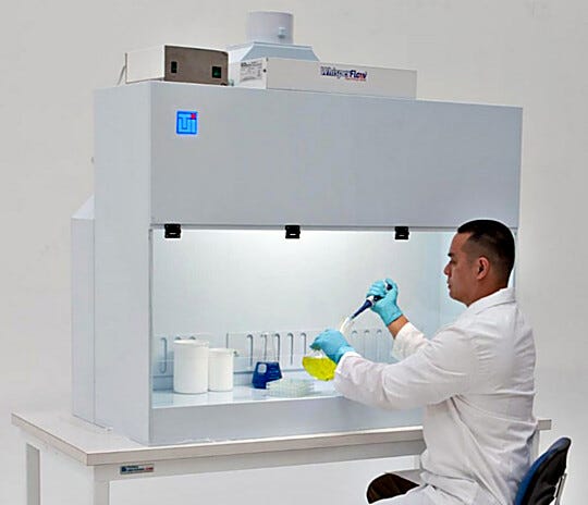 Shown: Polypropylene Containment Hood with fan/filter unit (sold separately), installed on optional work surface  |  2101-21 displayed