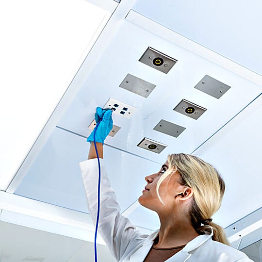 Keep utilities overhead and work areas clear with a 2'×2' polypropylene utility ceiling panel with eight configurable, covered ports  |  6706-09 displayed