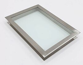 Flush-mounted stainless steel frame holds single tempered-glass window pane with CleanSeam ledge on opposite side.