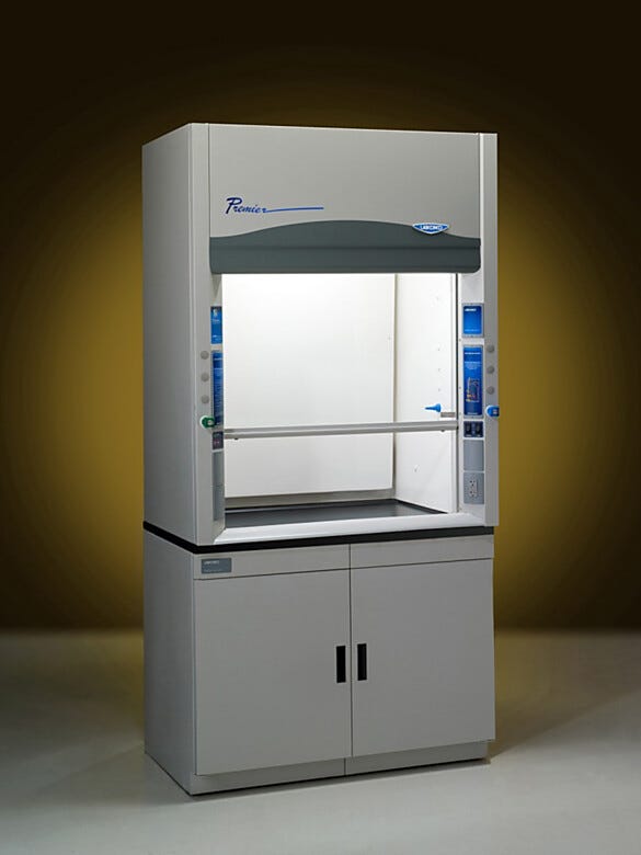 Four foot Protector Premier laboratory fume hoods by Labconco shown with optional storage cabinets | 3649-00 displayed