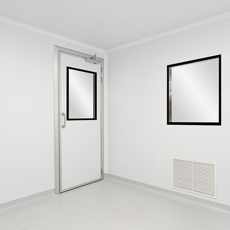 Modular cleanroom wall panel composed of an aluminum honeycomb core with uPVC steel shell provide a stick-built aesthetic  |  6603-66 displayed