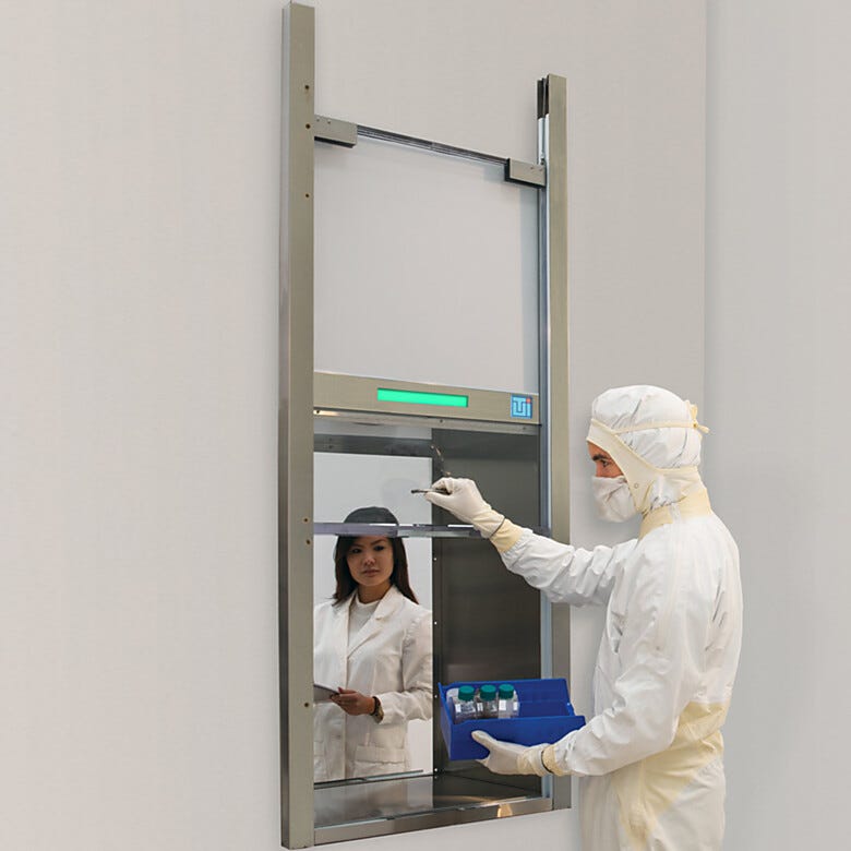 Slide-up door Smart Pass-Through with interlocked doors allows contamination-free parts transfer without door swing requirements  |  2635-46 displayed