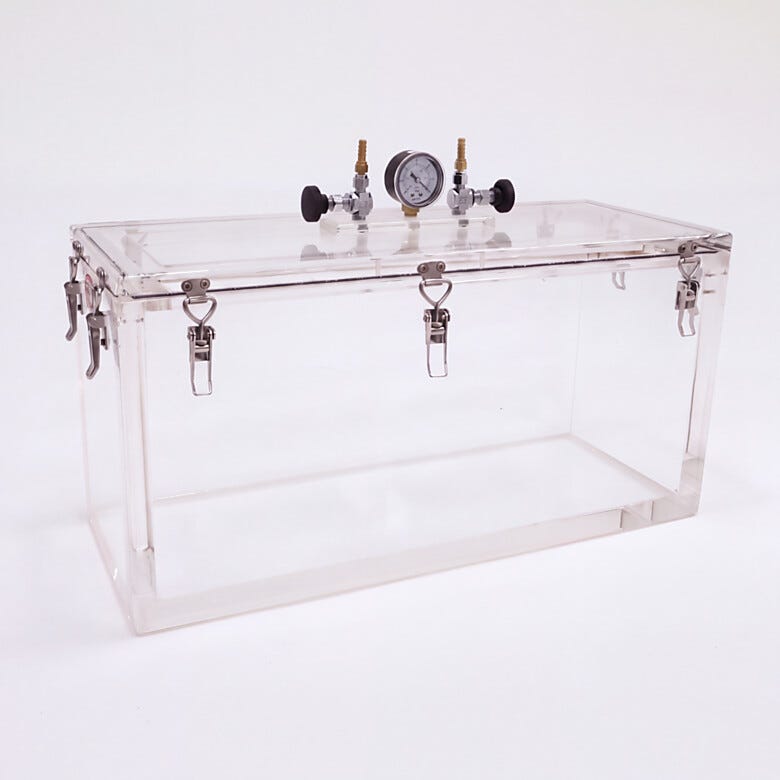 Inch-thick acrylic chamber walls support vacuum to 29.9
