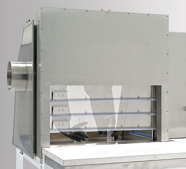 Pneumatic vertical sliding door on the back side of a glovebox isolator; allows easy hands-free access and transfer  |  1530-74B displayed