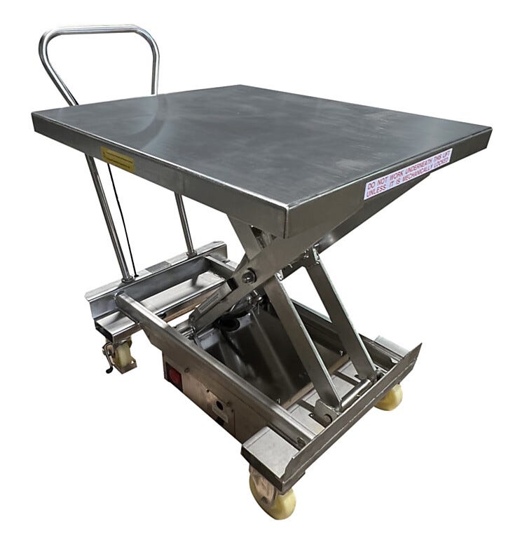 Stainless steel portable hydraulic lift table in raised position showing scissor mechanism, rectangular platform with safety labels, push handle, and mobile cas  |  1735-08 displayed