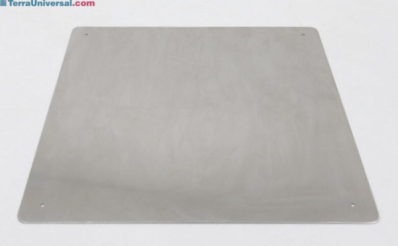 Stainless steel shield, installed on the floor of a plastic desiccator chamber, protects against scratching  |  1976-06 displayed