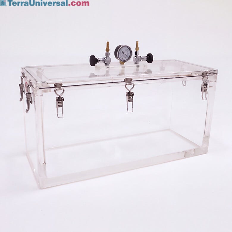 Inch-thick acrylic chamber walls support vacuum to 29.9