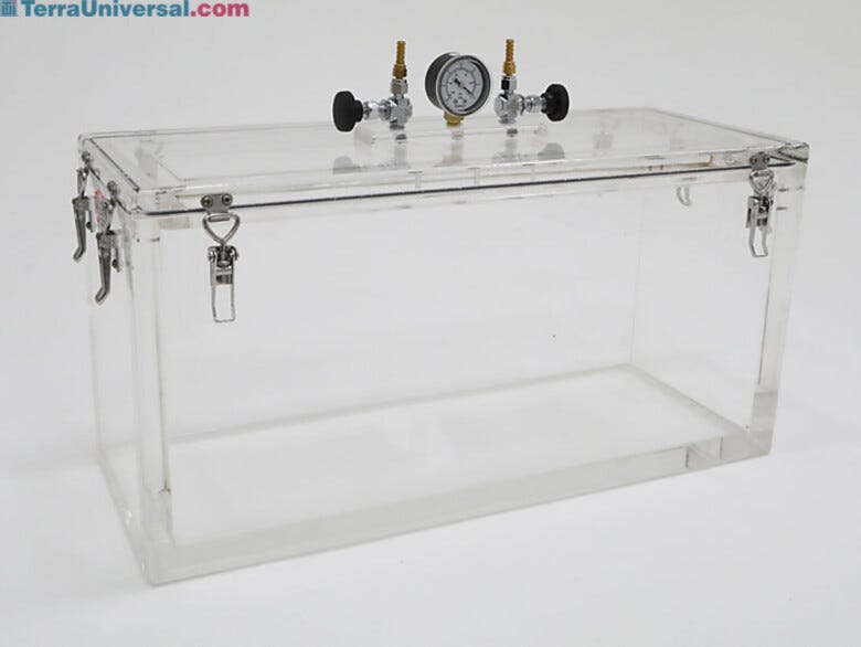Inch-thick acrylic chamber walls support vacuum to 29.9
