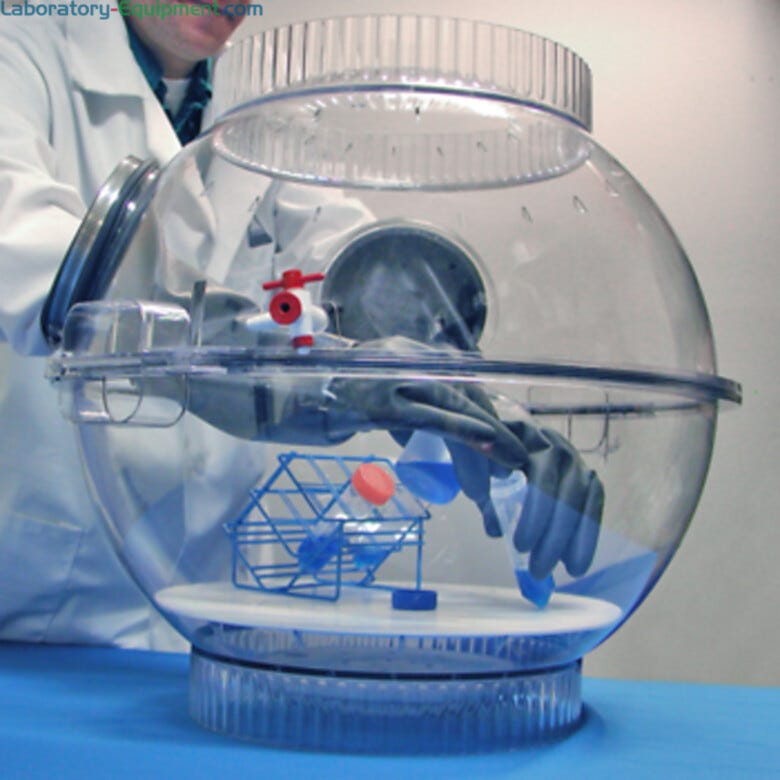 Bel-Art Polycarbonate 2 Glove Ports Techni-Dome Glove Box shown with model and props  |  1539-06 displayed