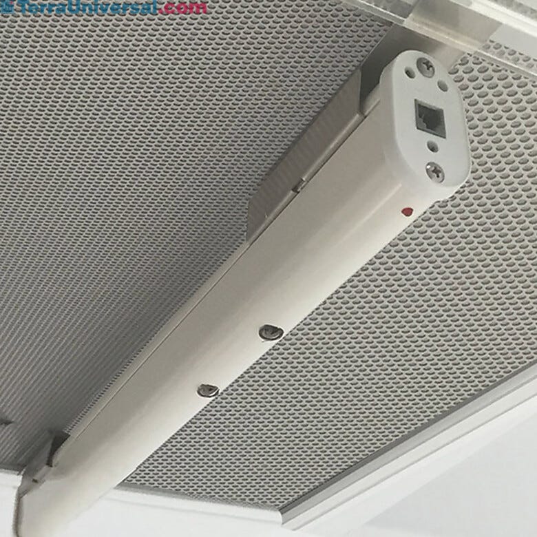Ionizing bar, shown mounted to cleanroom ceiling fan/fitler unit, neutralizes surface charges to prevent electro-static discharge (ESD)